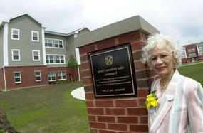 Dr. Alice Holloway Young in front of the residence halls